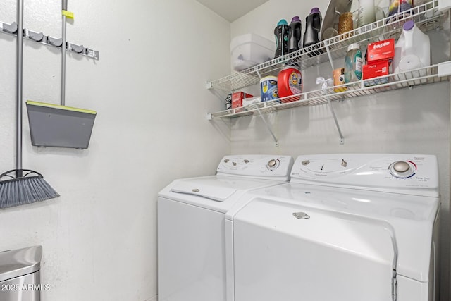 laundry room with independent washer and dryer and laundry area