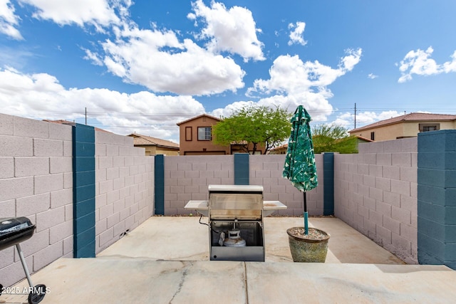 view of patio featuring a fenced backyard