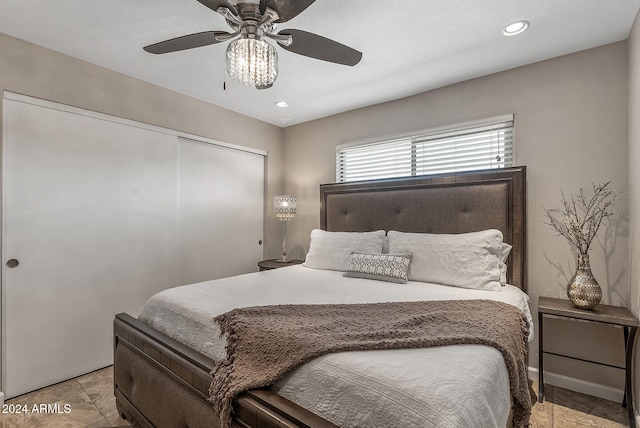 bedroom featuring a closet and ceiling fan