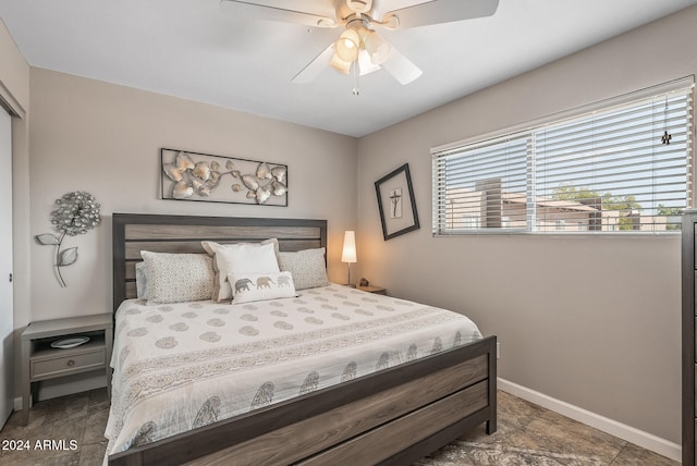 bedroom featuring ceiling fan