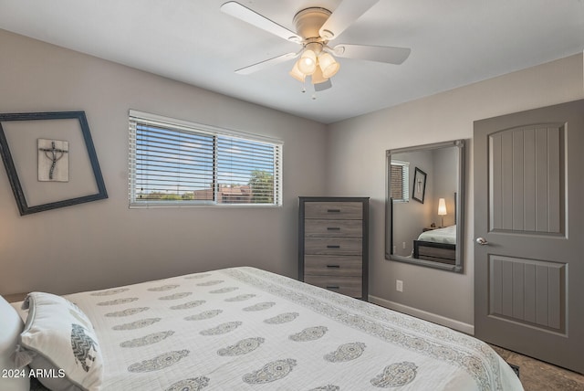 bedroom featuring ceiling fan