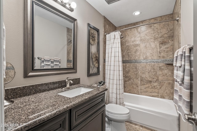 full bathroom featuring vanity, toilet, and shower / bathtub combination with curtain