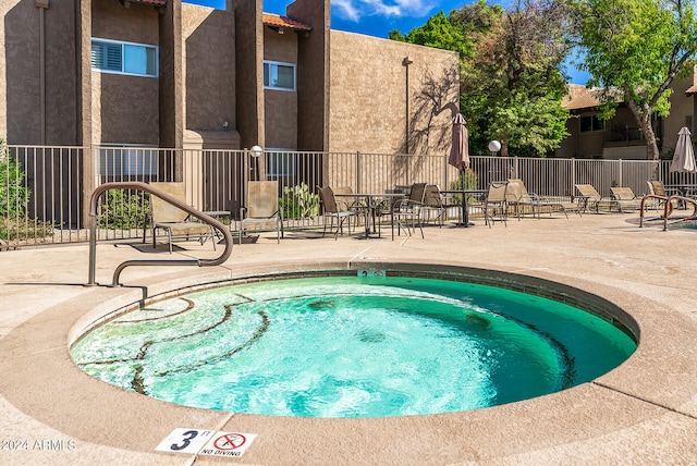 view of pool featuring a patio area