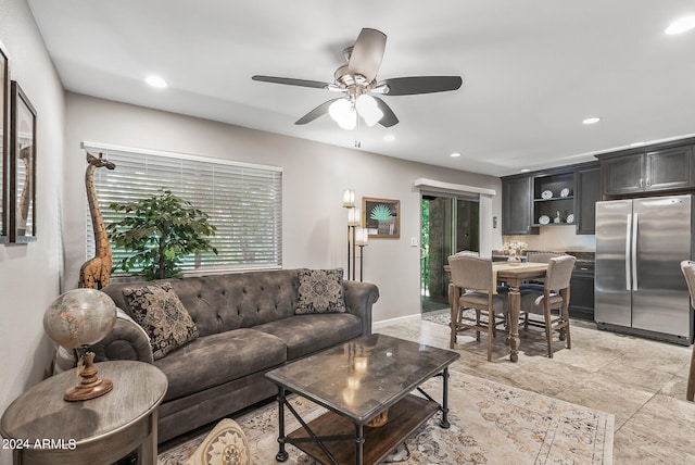 living room with ceiling fan