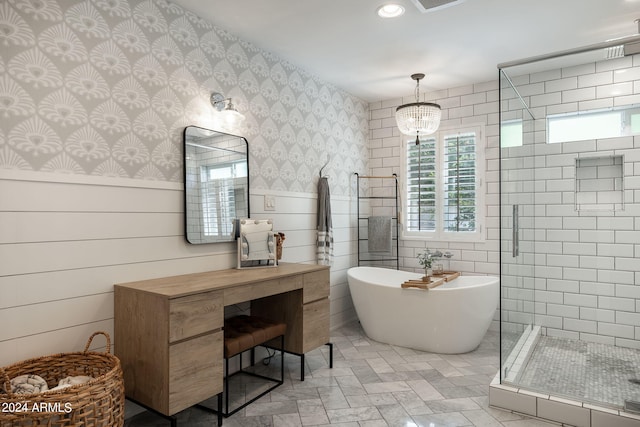 full bath with recessed lighting, a soaking tub, wainscoting, a shower stall, and wallpapered walls