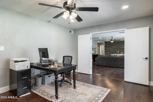 office with dark wood-style flooring, recessed lighting, visible vents, and baseboards