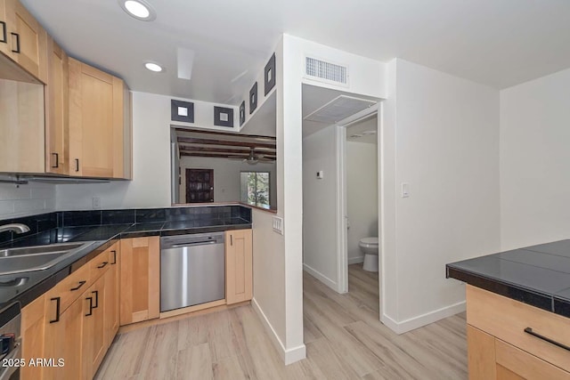 3637 E Monterosa St Unit 8, Phoenix, AZ 85018 - kitchen featuring dishwasher, light brown cabinetry, light wood finished floors, dark countertops, and recessed lighting