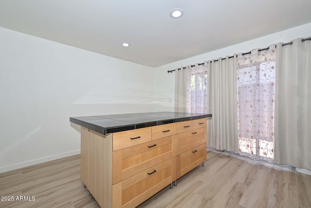 3637 E Monterosa St Unit 8, Phoenix, AZ 85018 - kitchen featuring tile countertops, light brown cabinetry, light wood-style floors, and recessed lighting