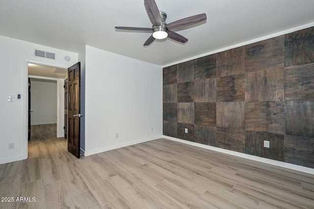 3637 E Monterosa St Unit 8, Phoenix, AZ 85018 - spare room featuring a ceiling fan and light wood-type flooring