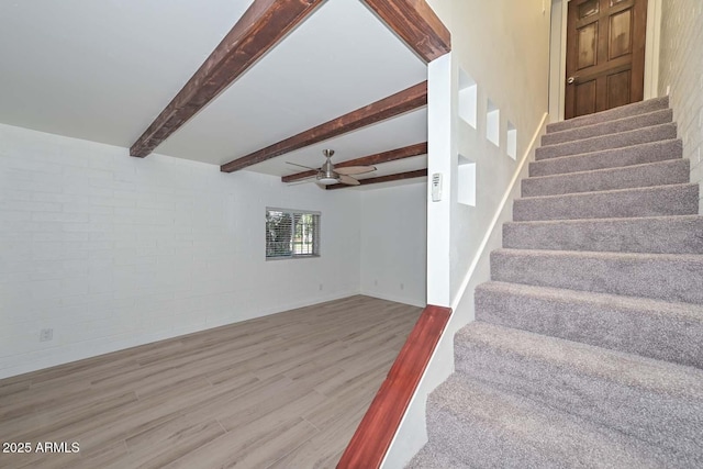 3637 E Monterosa St Unit 8, Phoenix, AZ 85018 - stairs featuring wood finished floors, a ceiling fan, and beamed ceiling