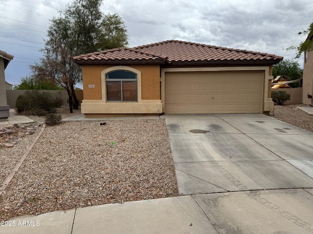 20761 N Herbert Ave, Maricopa, AZ 85138 - mediterranean / spanish home with concrete driveway, a tile roof, stucco siding, and a garage