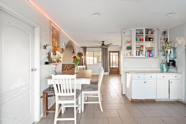 dining space with ceiling fan