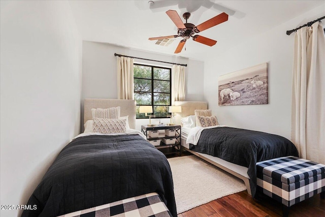 bedroom featuring ceiling fan and hardwood / wood-style floors