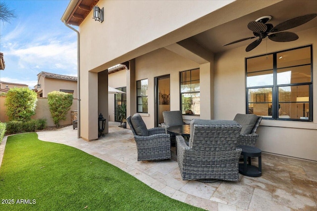 view of patio with ceiling fan