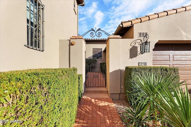 entrance to property with a garage