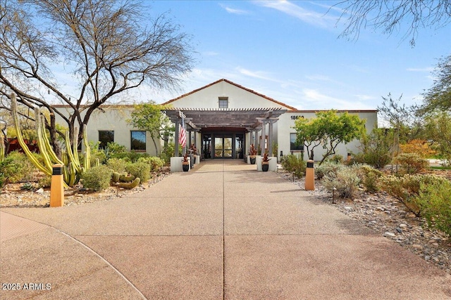 view of front facade with a pergola