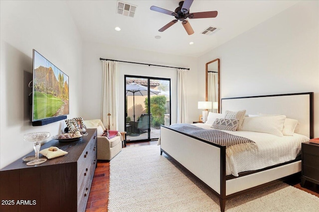 bedroom with hardwood / wood-style flooring, access to exterior, and ceiling fan