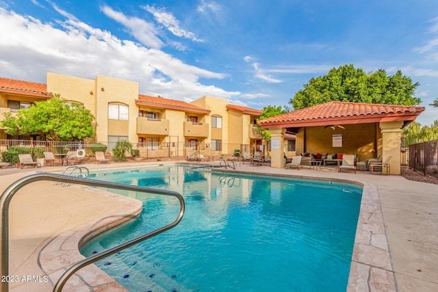 7008 E Gold Dust Ave Unit 236, Scottsdale, AZ 85253 - community pool featuring an outdoor living space and a patio area