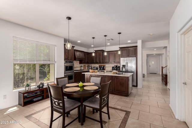 20409 W Thayer St, Buckeye, AZ 85396 - dining area featuring light tile patterned flooring and recessed lighting