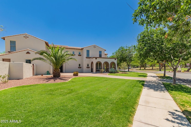 20409 W Thayer St, Buckeye, AZ 85396 - mediterranean / spanish house with stucco siding and curved driveway