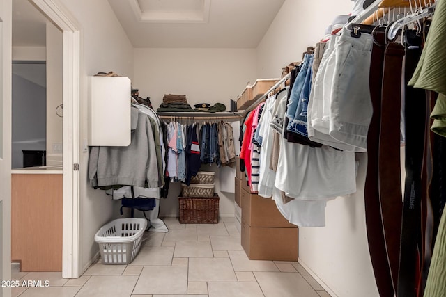 20409 W Thayer St, Buckeye, AZ 85396 - walk in closet with attic access and tile patterned flooring