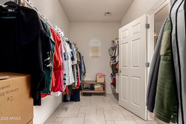 20409 W Thayer St, Buckeye, AZ 85396 - walk in closet featuring tile patterned floors