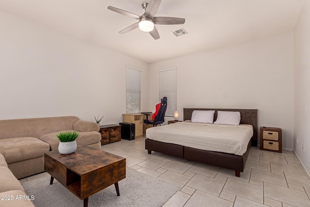 20409 W Thayer St, Buckeye, AZ 85396 - bedroom with ceiling fan and light tile patterned flooring