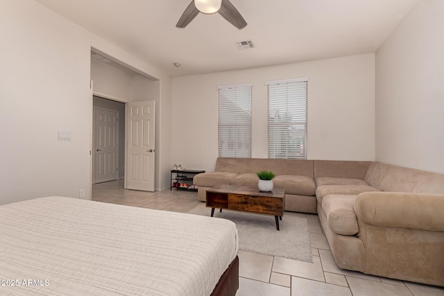 20409 W Thayer St, Buckeye, AZ 85396 - bedroom with light tile patterned floors and a ceiling fan