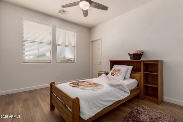 20409 W Thayer St, Buckeye, AZ 85396 - bedroom featuring wood finished floors and a ceiling fan