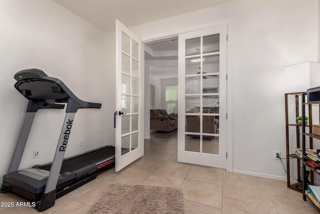 20409 W Thayer St, Buckeye, AZ 85396 - workout room with french doors and tile patterned flooring