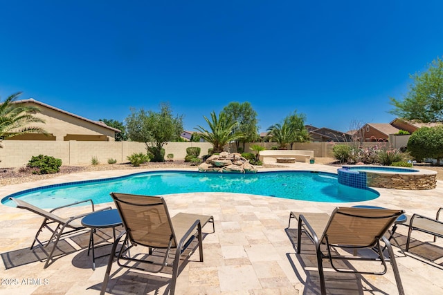 20409 W Thayer St, Buckeye, AZ 85396 - view of swimming pool with a fenced backyard, a patio, and a pool with connected hot tub