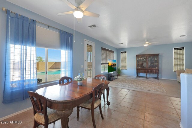 6993 S Sharon Ct, Chandler, AZ 85249 - dining room featuring light tile patterned flooring, baseboards, a ceiling fan, and visible vents