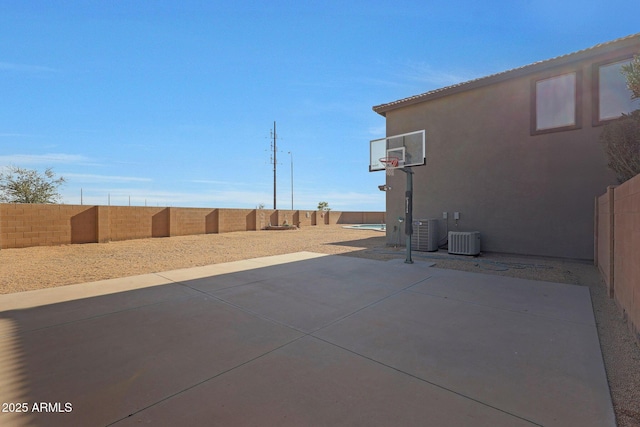 6993 S Sharon Ct, Chandler, AZ 85249 - view of patio featuring a fenced backyard and central AC