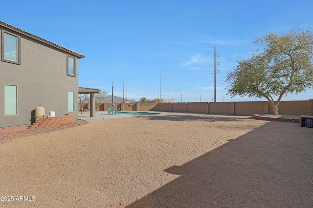 6993 S Sharon Ct, Chandler, AZ 85249 - view of yard featuring a patio area and a fenced backyard