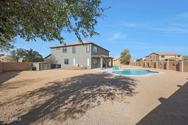 6993 S Sharon Ct, Chandler, AZ 85249 - view of swimming pool with a patio, a fenced backyard, a fenced in pool, and a shed