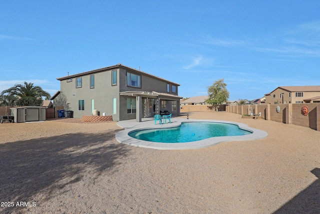 6993 S Sharon Ct, Chandler, AZ 85249 - view of swimming pool with a fenced in pool, a patio, an outdoor structure, a shed, and a fenced backyard
