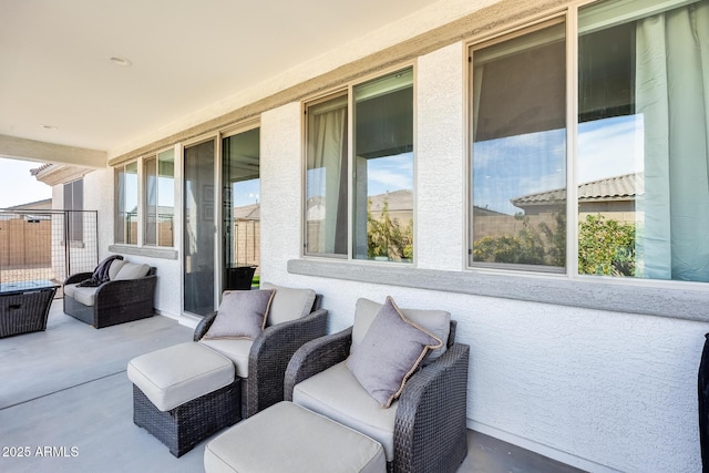 view of patio with a balcony