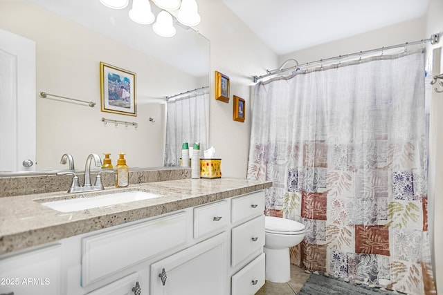 bathroom with tile patterned flooring, vanity, a shower with shower curtain, and toilet