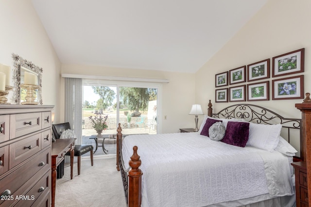 bedroom with lofted ceiling, access to exterior, and light carpet