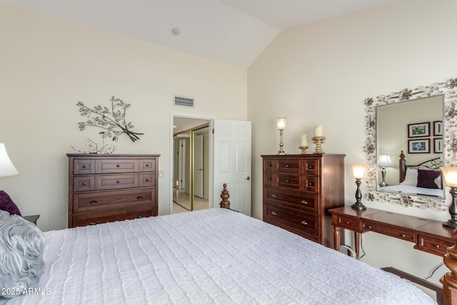 bedroom featuring lofted ceiling