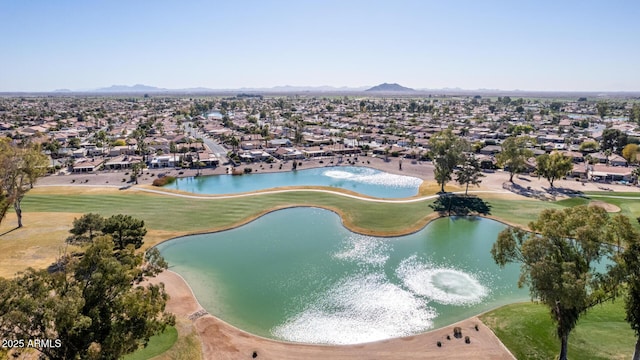 aerial view with a water and mountain view