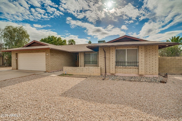 single story home with a garage