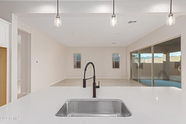 kitchen with sink and hanging light fixtures