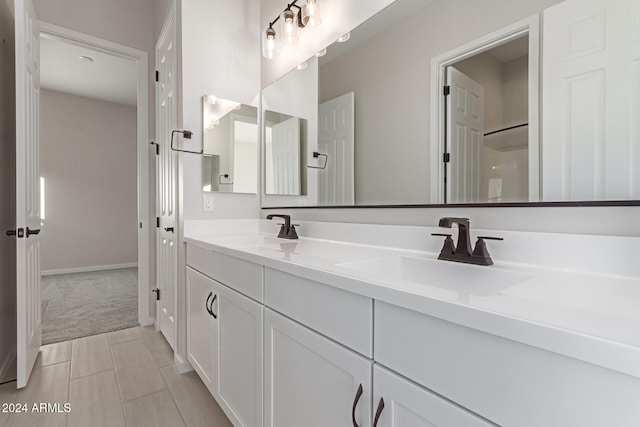 bathroom featuring vanity and tile patterned floors