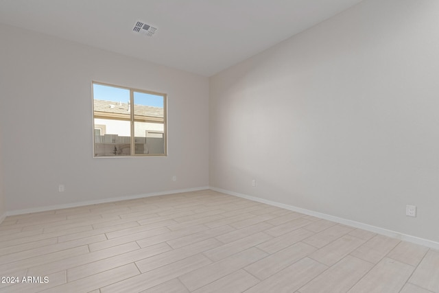 empty room with light wood-type flooring