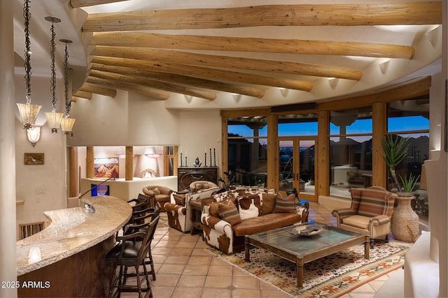 interior space with beam ceiling and light tile patterned floors