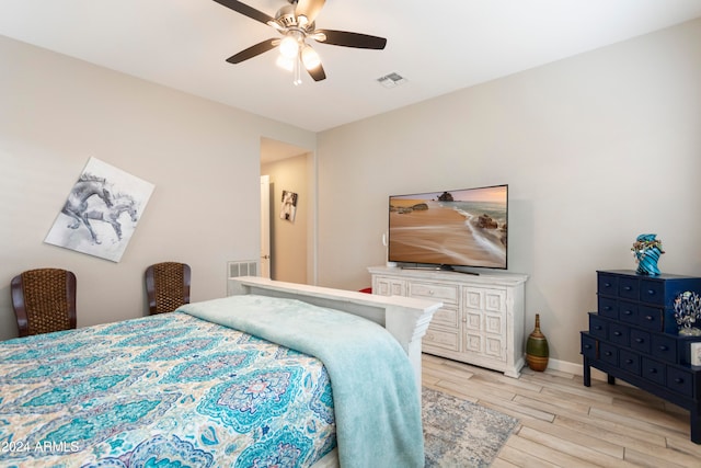 bedroom featuring ceiling fan and light hardwood / wood-style flooring