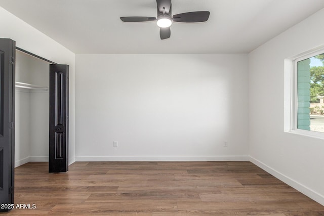 8602 N 42nd Dr, Phoenix, AZ 85051 - unfurnished bedroom with wood finished floors, ceiling fan, and a closet