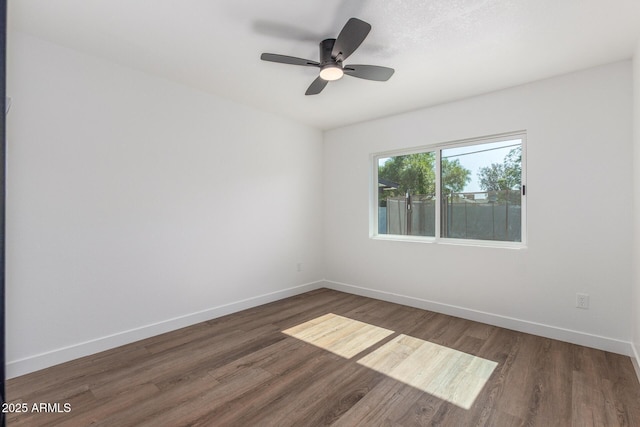 8602 N 42nd Dr, Phoenix, AZ 85051 - empty room featuring wood finished floors and a ceiling fan