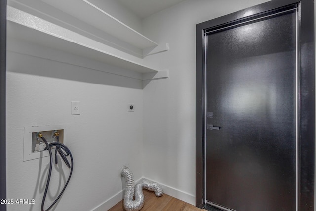 8602 N 42nd Dr, Phoenix, AZ 85051 - laundry area featuring electric dryer hookup, washer hookup, and wood finished floors